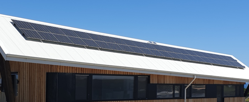 Solar panels on a white roof